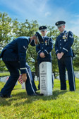 Members of the Air Force honor guard place flag at the headstone of their friend Airman First Class (A1C) Alvin Cornelius Mack III